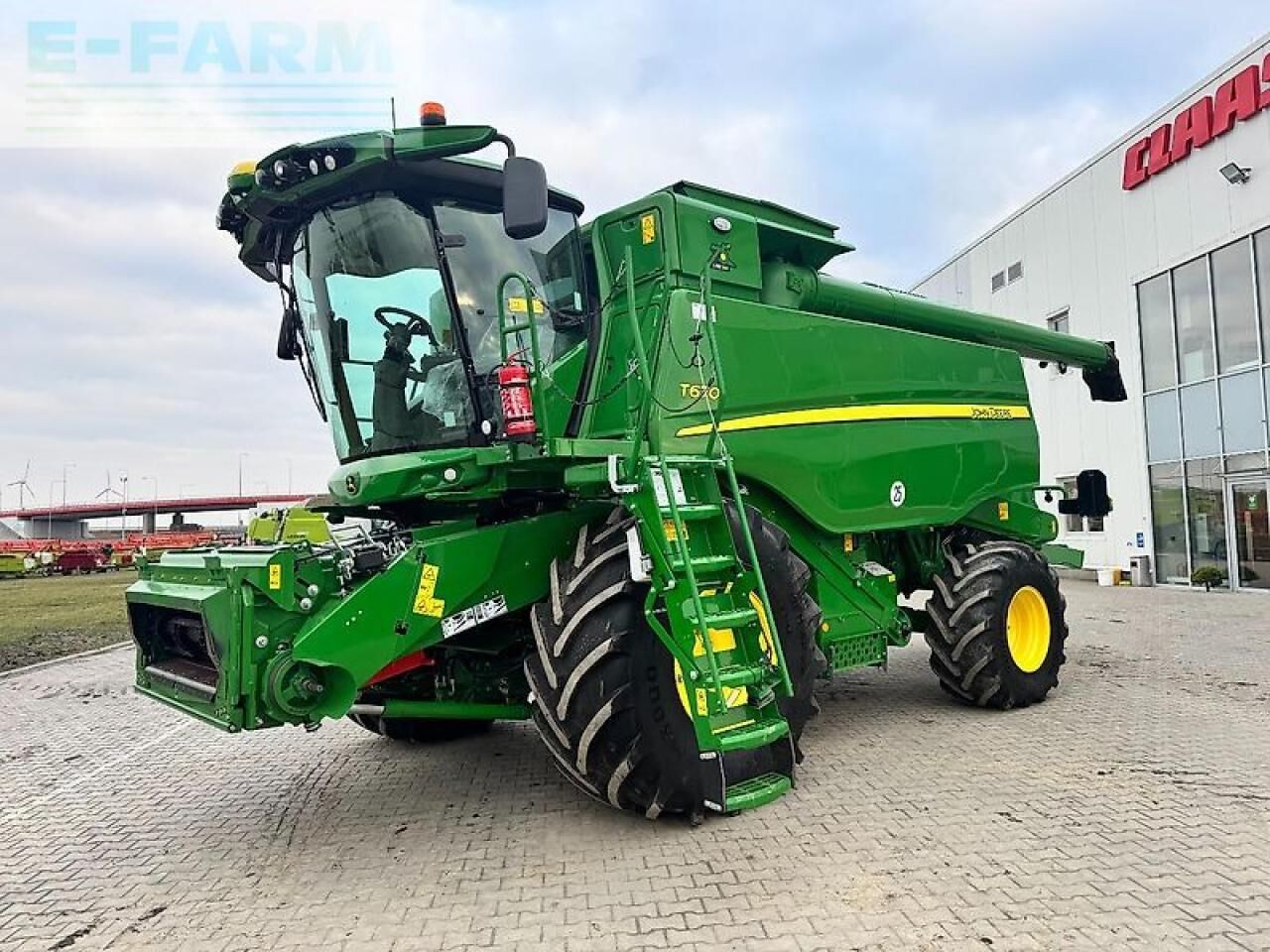 John Deere t670i + 725x